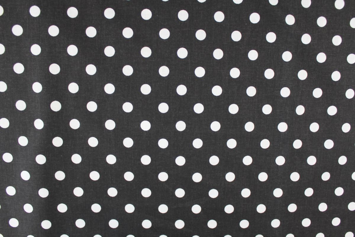 Černá bavlna se středními bílými puntíky -1,1 cm vyrobeno v EU- atest pro děti bavlna